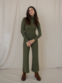 Domenique is 5'11'' (S)