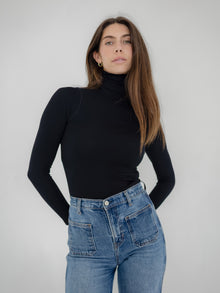 Domenique is 5'11'' (S)