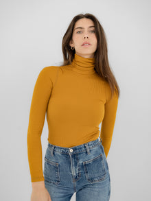 Domenique is 5'11' (S)