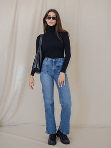 Domenique is 5'11'' (S)