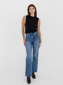 Domenique is 5'11'' (S)