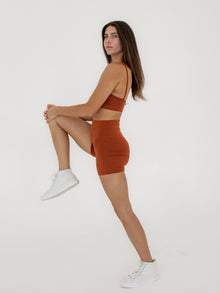 Domenique is 5'11'' (S)