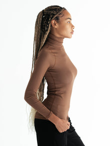 Jarika is 5'8'' (S)